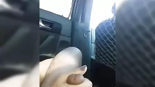 A girl pleasures an Uzbek man's penis in a car